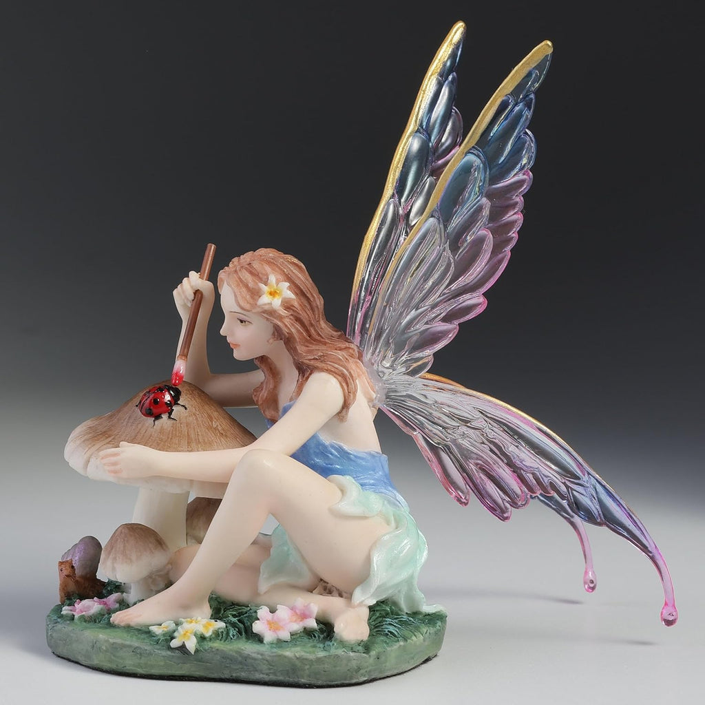 Chromatic Fairy Painting a Lady Bug Figurine