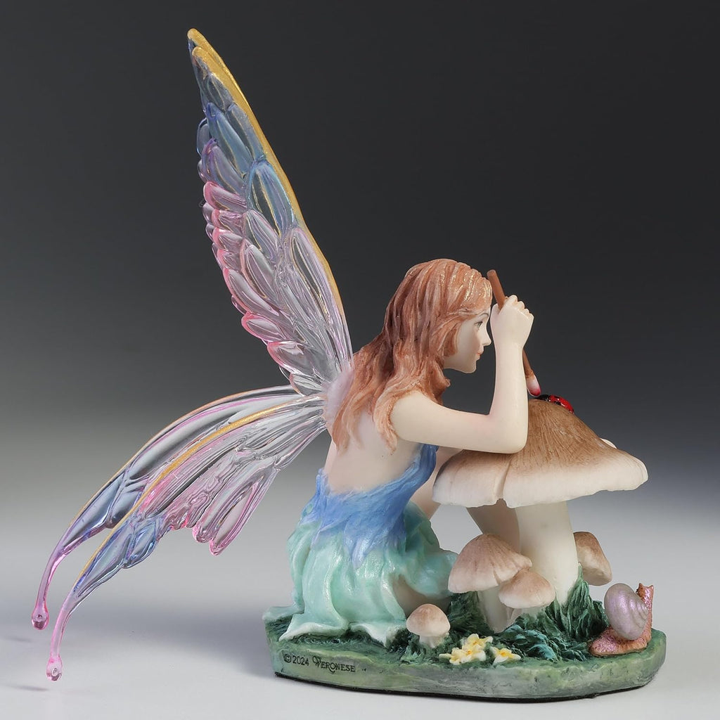 Chromatic Fairy Painting a Lady Bug Figurine