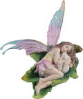 Stellate Fairy Cuddling a Bunny Figurine