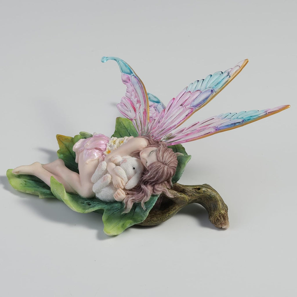Stellate Fairy Cuddling a Bunny Figurine