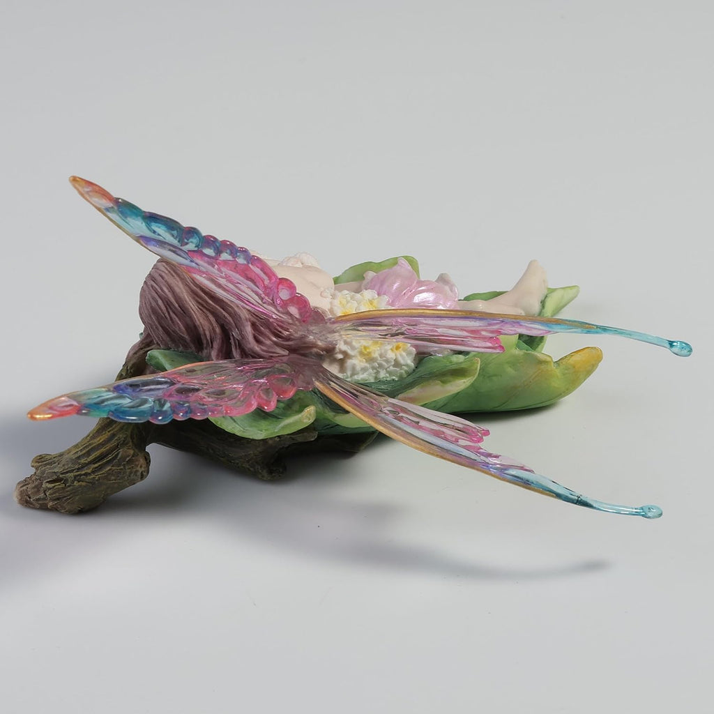 Stellate Fairy Cuddling a Bunny Figurine