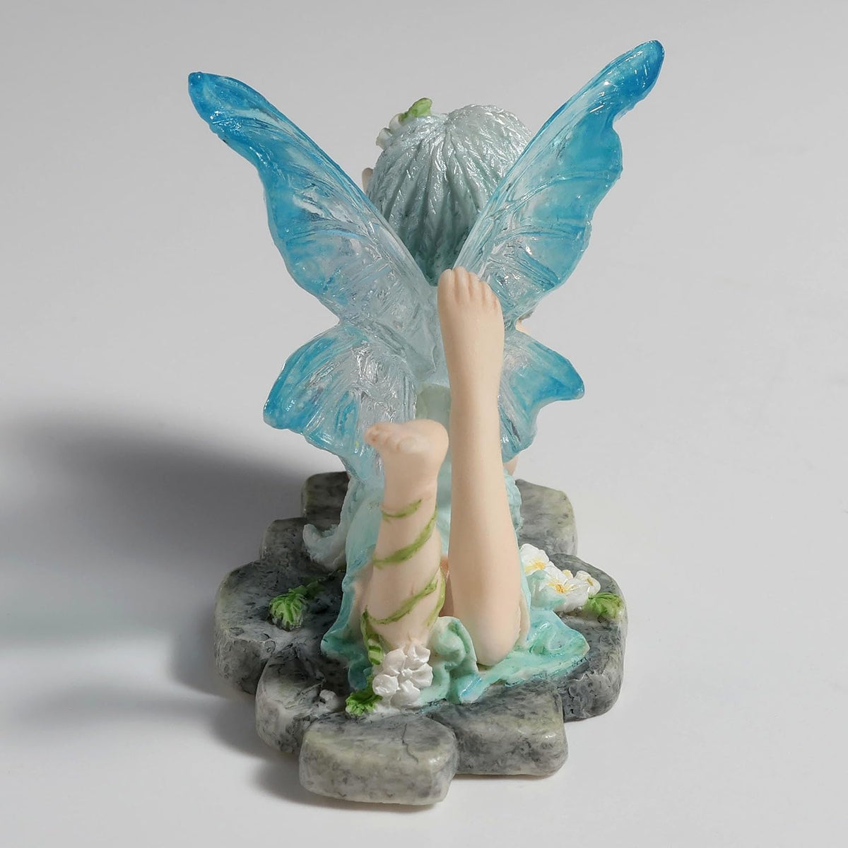 Cerulean Playful Lying Down Fairy Figurine