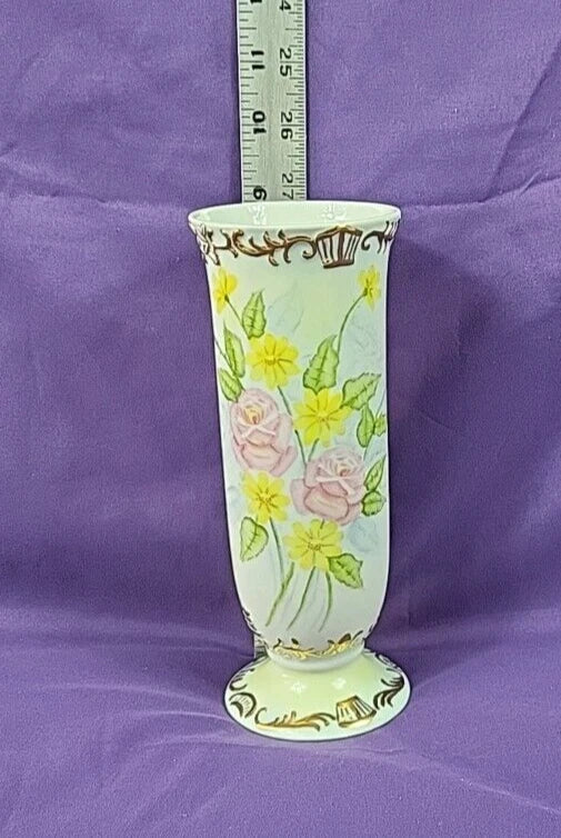 Hand-painted ivory ceramic vase with pink roses, yellow flowers, and gold scrollwork by Greta Addy 1972